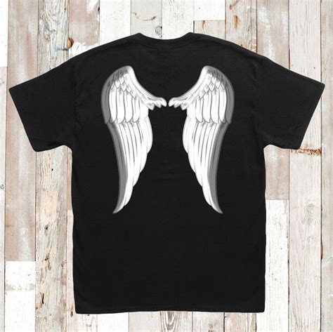 angel wings on back of shirt|More.